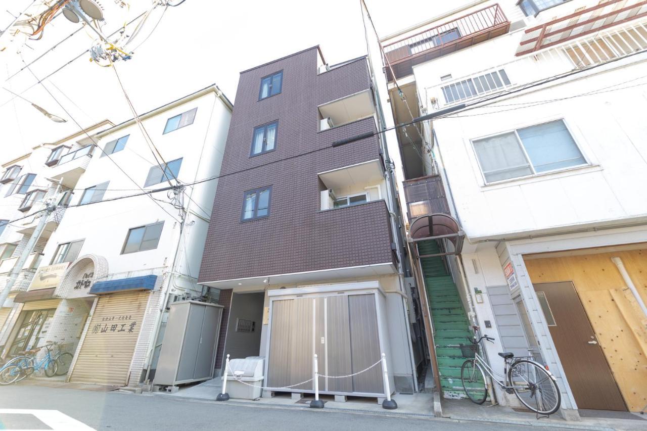 Guest House Nisso Osaka Exterior foto